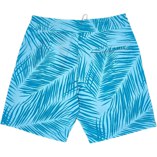 Blue and light blue tropical palm leaf print swim trunks with a drawstring waistband, shown flat against a white background.