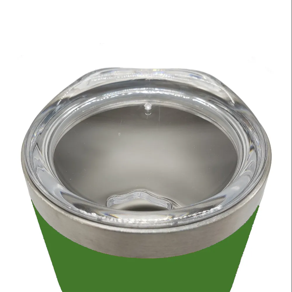 Close-up of a green insulated tumbler with a clear plastic lid and a brushed silver metal rim, shown against a plain white background.