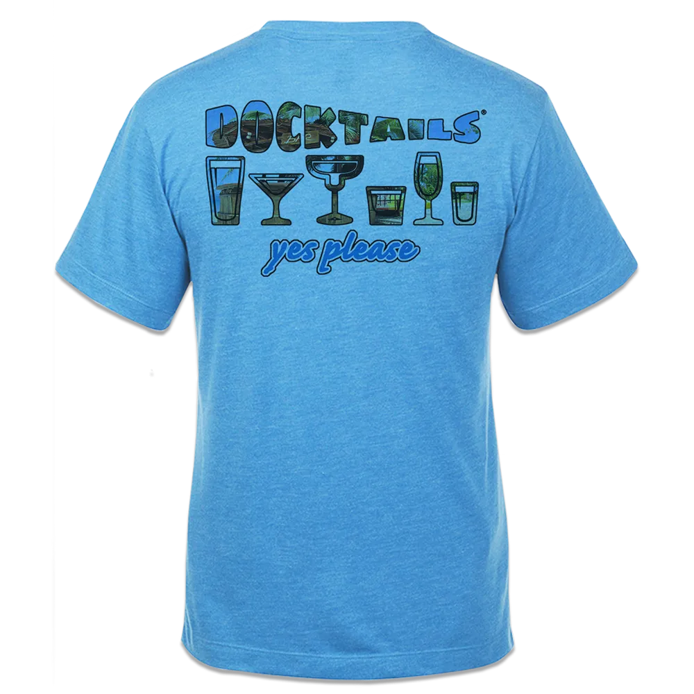 Short-sleeve blue t-shirt with the word Docktails, 6 drink glasses, and the words yes please on the back. The word Docktails and the drink glasses have a tropical image inside them including palm trees and portions of a beach and tiki bar.