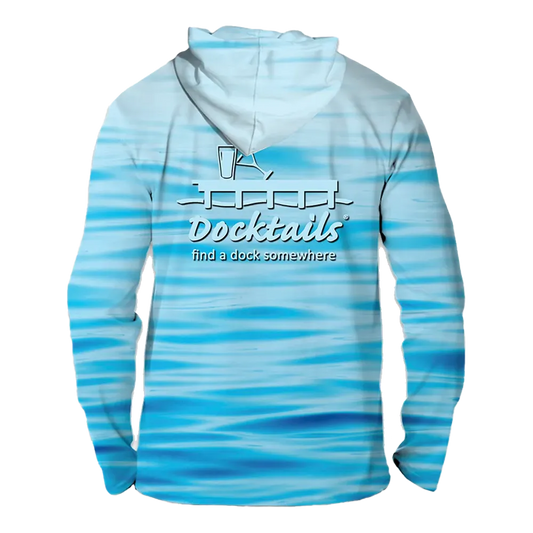 A long-sleeve hooded shirt with a blue and white water-wave pattern, featuring a white graphic on the back with a cocktail glass and the text 'Docktails' and 'find a dock somewhere'.